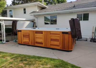 uncovered all weather pool arctic spas in red cedar cabinet